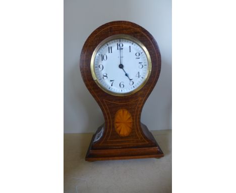 A mahogany and inlaid case balloon style mantel clock - Height 23cm 