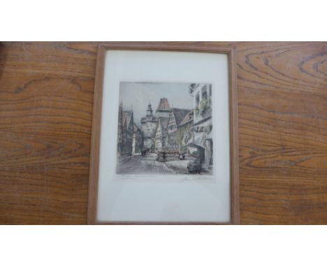 A hand coloured copper plate etching of a Continental Town scene, signed in pencil to margin - 34cm x 44cm 