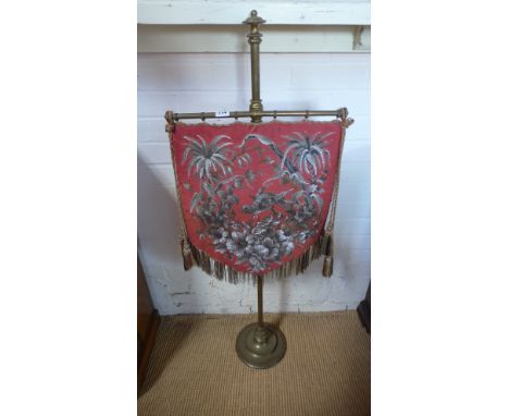 A brass fire screen with bead work design - Height 120cm x Width 42cm