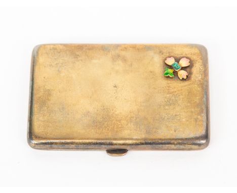 A Victorian small silver gilt cigarette case, hallmarked 1887, George Wilkinson,  with applied enamelled flower head