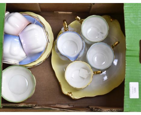 A Royal Albert Rainbow part tea service, comprising six cups, six saucers, five side plates, a cake plate, a milk jug and sug