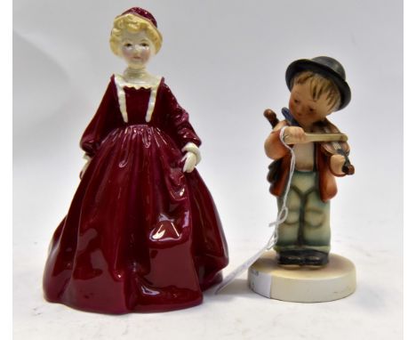 A German Goebel figurine and a Royal Worcester figurine Grandmothers Dress