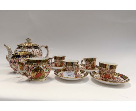 A Royal Crown Derby late 19th Century Birds Imari to include teapot (af) four coffee cups and saucers, cream jug and sugar bo