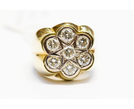 A gentleman's seven-stone diamond yellow gold ring, round brilliant-cut diamonds approx 3cts total, flower and star head deta