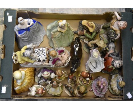 A collection of assorted ceramics including; Hummel figures, Franklin Mint, an early 20th Century lady figure, plus many othe
