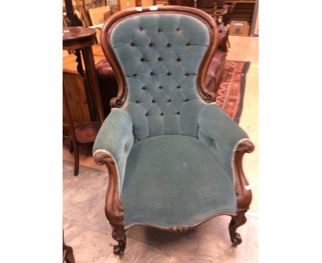 A Victorian button back armchair, turquoise upholstery