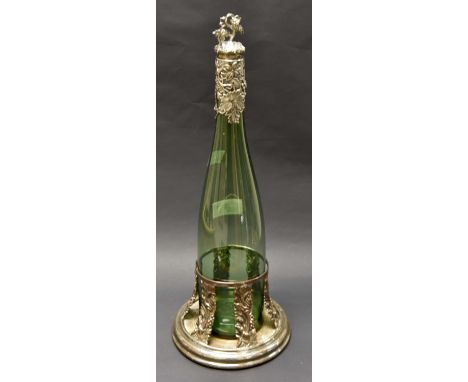 A 19th Century green glass decanter with stopper 