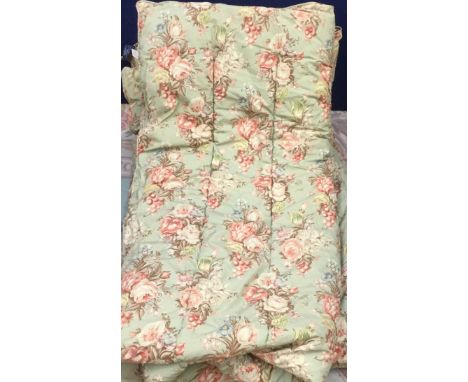 A 1950/60s quilted floral eiderdown 