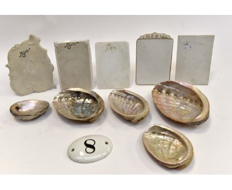 Ceramic menu stands, five with mother of pearl shells and a gate ceramic Number 8