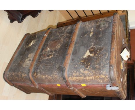 An early 20th Century steamer trunk, wood bound