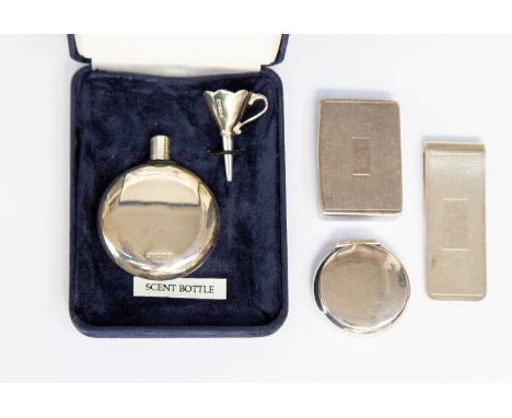 A silver snuff or pill box, Birmingham 1932, silver money clip and pill box and boxed scent bottle (4)