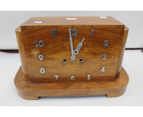 A 1930s veneered mantle clock, Arabic numerals 