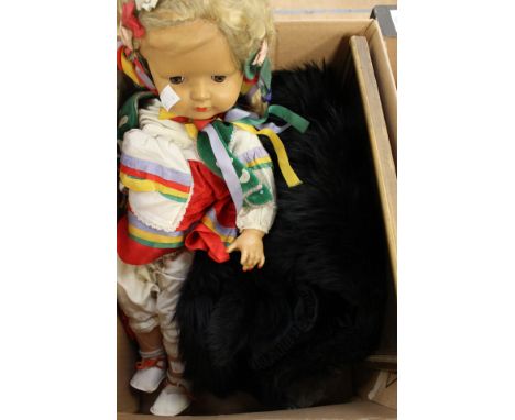 1950's celluloid jointed Swiss doll, with blonde plaited pigtails and 2 Art Deco black fur wraps, and a framed print of an el