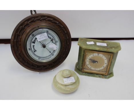 Onyx Elliot mantle clock, carved oak barometer and an onyx powder pot (3)