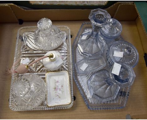 A blue glass six piece dressing table set together with a clear glass part set, two cologne bottles and stoppers plus tray, c