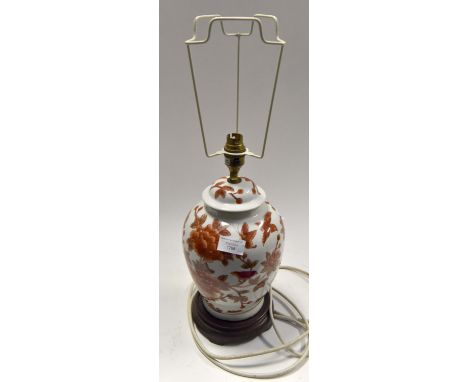 Ceramic lamp base, orange flowers on white background
