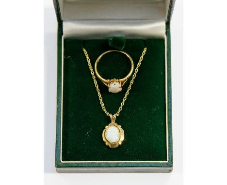 A 9 ct opal set pendant and chain, plus an opal 9 ct ring