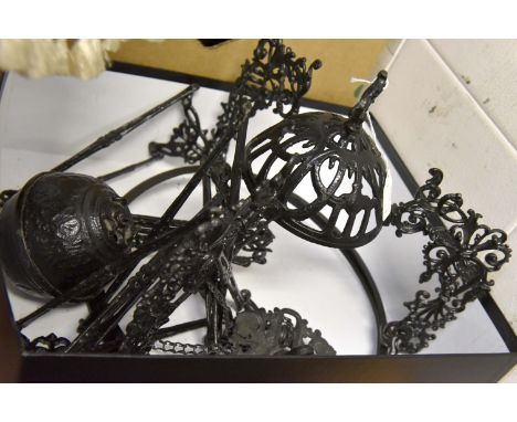 A late 19th / early 20th Century black painted hanging ceiling lamp, complete with ceramic reservoir, with adjustable mechani