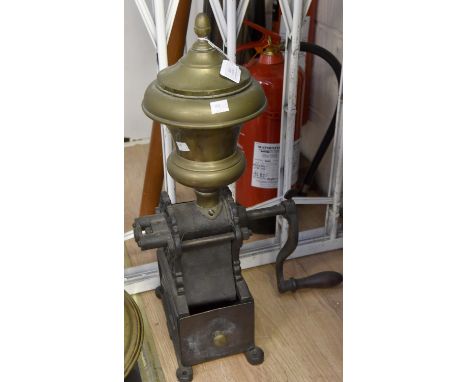 A Victorian shop coffee bean grinder, cast iron base, marked L.L. brass hopper and cover, handle included