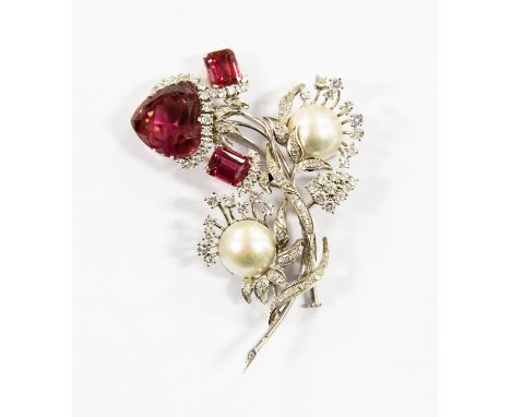 A pink tourmaline, pearl, diamond and platinum spray brooch, set with a large heart-cut pink tourmaline approx 16mm x 16mm x 