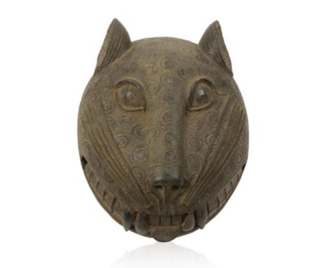 A 'BENIN' STYLE BRONZE LEOPARD'S HEAD well modelled and of good size, decorated overall with small finely incised concentric 