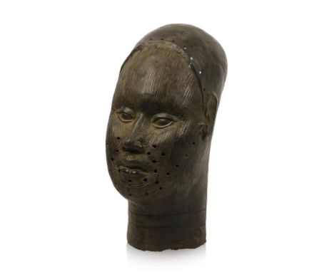 A BRONZE 'IFE' STYLE HEAD Nigeria, the very large elegant head with vertical scarifications covering the well balanced face, 
