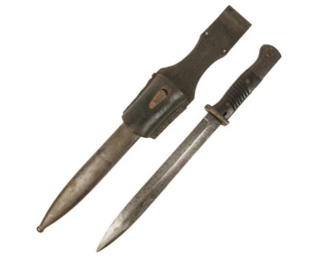 A WW2 GERMAN K98 BAYONET with metal scabbard and leather frog, 40cm long