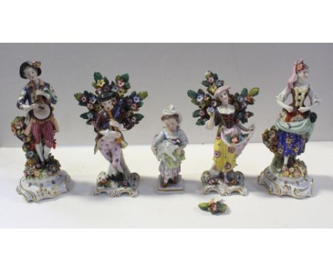 A pair of c1750 figures, a young man in period costume playing the flute and tambourine, hand-painted and gilt-heightened wit