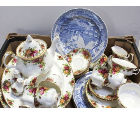 An 'Old Country Roses' six-setting part tea and dinner service comprising six dining plates, five starter plates, seven side 