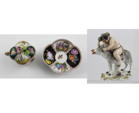 A Naples figure of a young Bacchus riding a donkey with crowned N mark to base, height 17cm and a 19th century trembleuse wit