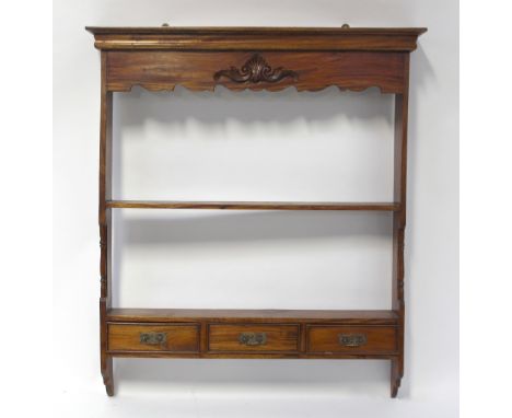 A modern tropical hardwood three-drawer shelf unit with Victorian brass handles, 102 x 98 x 18cm.