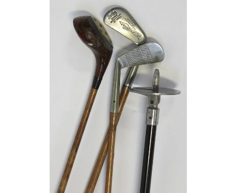 Three vintage hickory-shafted golf clubs to include a driver, a mashie, an 'A Frost Special' 2 iron and a Featherwaite shooti