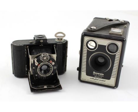 A cased Kodak Brownie and a cased Kodan Vollanda camera (2).