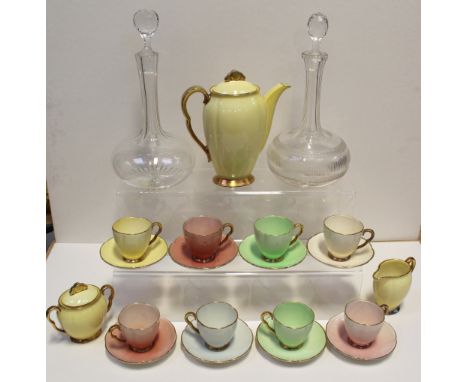 An early-to-mid 20th century Art Deco style Carltonware multi-coloured gilt-heightened coffee set, to include coffee pot, suc