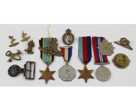 A trio of WWII medals comprising 1939-45 Star, Defence Medal and the Air Crew Europe Star, each with ribbons and a selection 