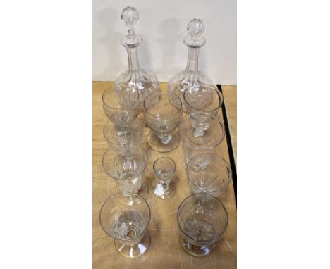 A pair of Victorian cut glass decanters and various 19th and early 20th century glasses to include a pair of engraved rummers