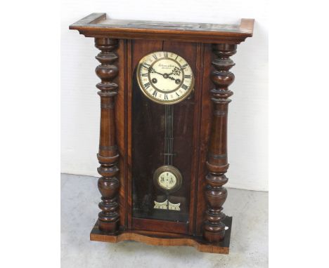 A late 19th/early 20th century Vienna-style eight-day wall clock, Fattorini &amp; Sons, Bradford, the ceramic dial set with A