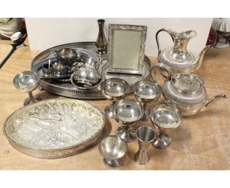 A collection of plated ware to include an hors d'oeuvres tray, a set of five goblets, spirits measure, cruet set, an MH & Co 
