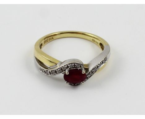 An 18ct ruby solitaire and chip diamond cross-over ring, size P, approx 4g, presented in W A Metcalfe jeweller's ring box.