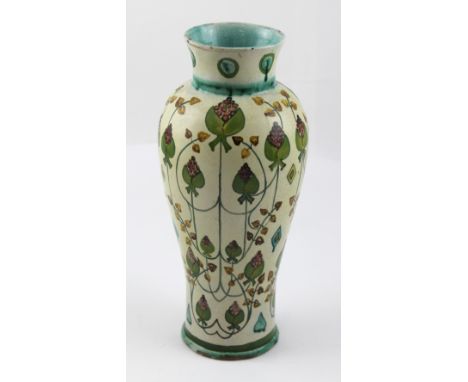 Della Robbia; an Arts and Crafts baluster vase decorated with painted cabochon to the neck and stylised floral blossoms in gr