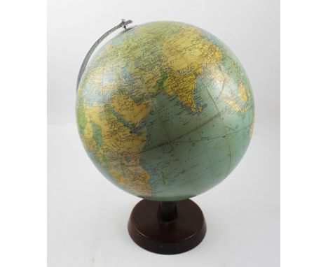 A 13-1/2 inch Philip's Challenge Globe, scale 1:37,500,000, produced in 1961, presented on chrome half loop and wooden base, 