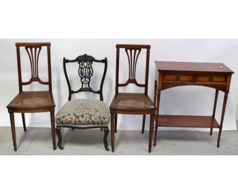 A pair of wheatsheaf-back cane-seated bedroom chairs, a small ebonised Edwardian nursing chair with harebell carved back and 