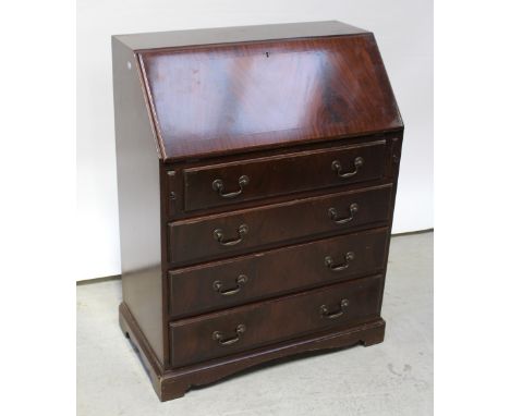 A mid-to-late 20th century mahogany bureau with fitted interior and manual lopers on a four-drawer plinth base, height 99.5cm