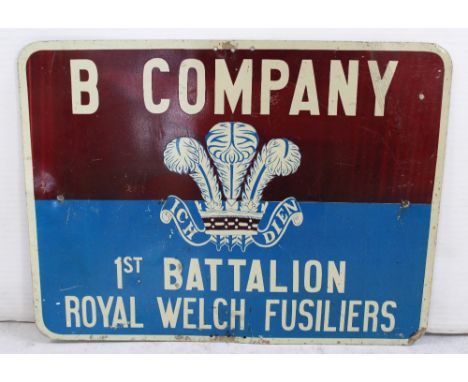 A mid-to-late 20th century First Battalion Royal Welsh Fusiliers B Company printed sign in claret and blue, 45.5 x 61cm.