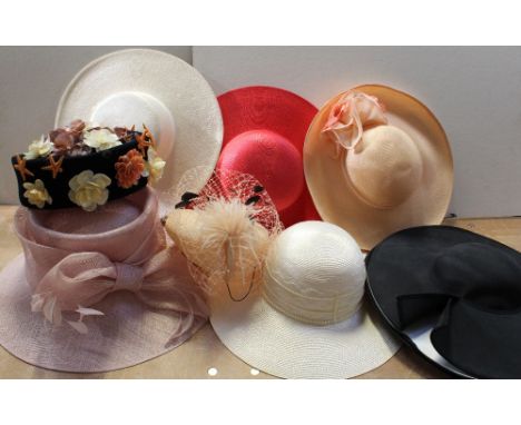 A hat box containing nine vintage hats to include large brimmed example, 1940s-style veiled hat and a Russian-style hat decor