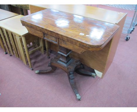 A Regency Mahogany Fold Over Card Table, with crossbanded swivel top with baize interior, on shaped pedestal and four splayed