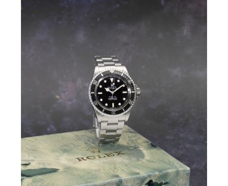 Rolex. A stainless steel automatic bracelet watch with Tiffany signed dialModel: SubmarinerReference: 5513/5512Date: circa 19