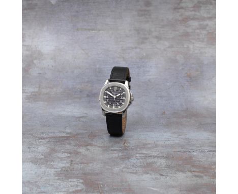 Patek Philippe. A stainless steel automatic calendar wristwatchModel: AquanautReference: 5060A-001Date: Circa 1997Movement: 2