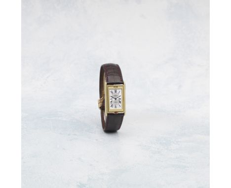 Cartier. A Limited Edition 18K gold manual wind reversible rectangular wristwatchModel: Tank Basculante 150th Anniversary 'I 