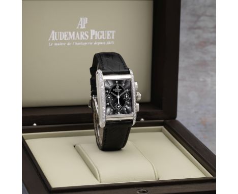 Audemars Piguet. An 18K white gold and diamond set automatic calendar chronograph wristwatchModel: Edward Piguet ChronographR